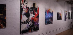 The large scale collaborative pieces hang at the gallery